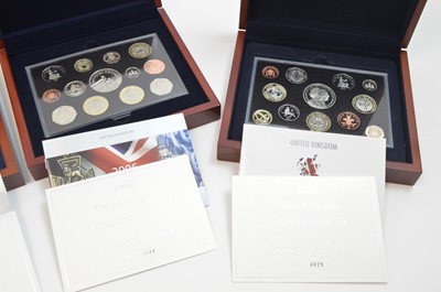 Lot 825 - Royal Mint United Kingdom: four Executive proof collection coin sets.