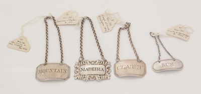 Lot 243 - Four silver Birmingham-made wine labels.