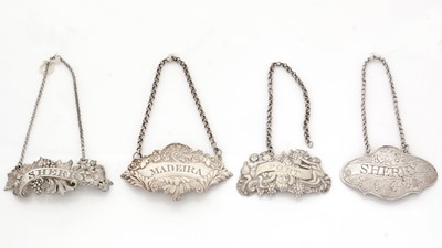 Lot 286 - Four silver wine labels, various.