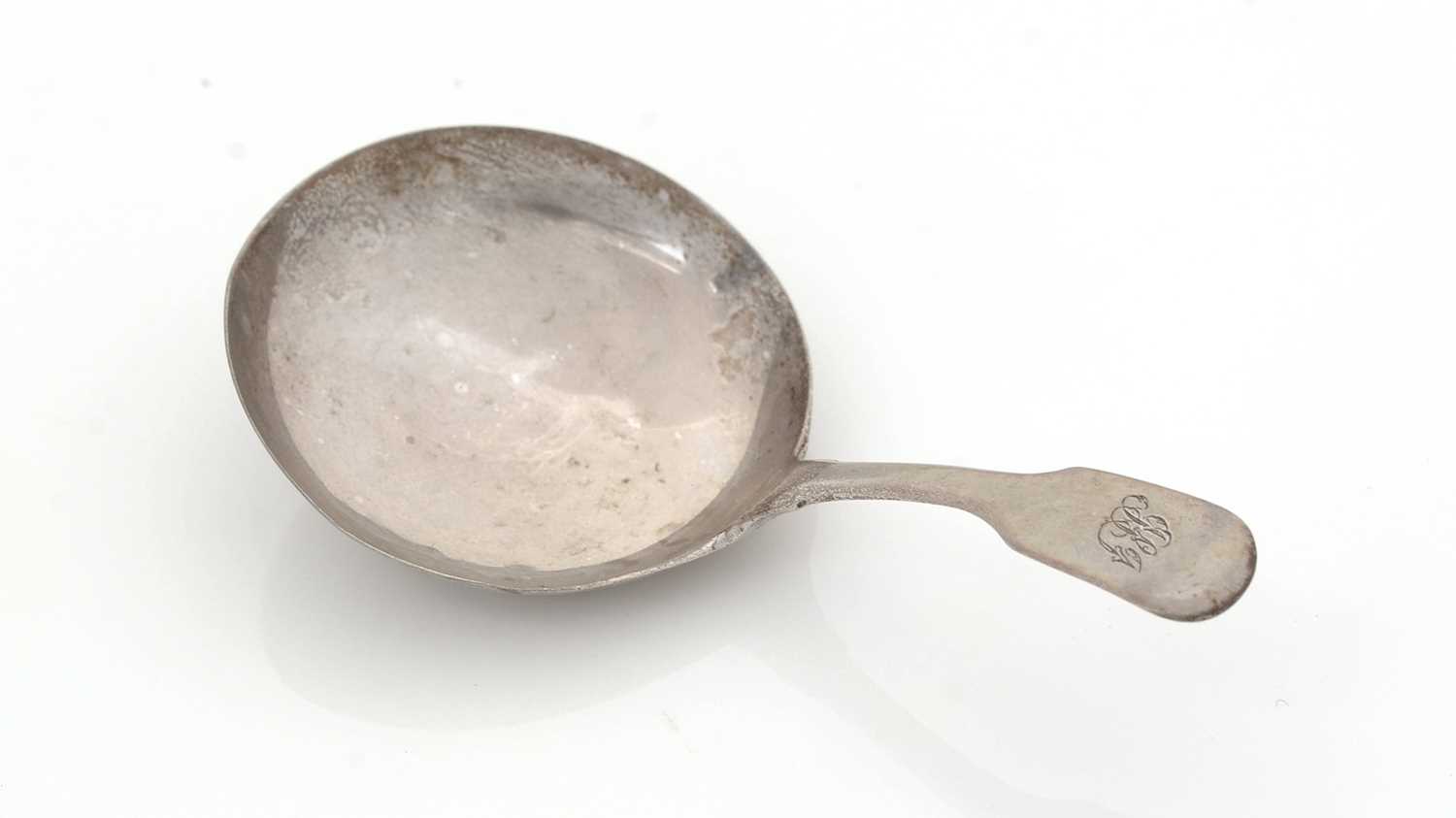 Lot 39 - A William IV silver Provincial caddy spoon.