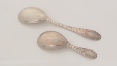 Lot 42 - A Victorian silver Provincial caddy spoon and matching sugar spoon.
