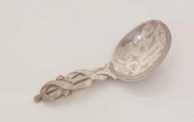 Lot 50 - A Victorian silver engraved caddy spoon.