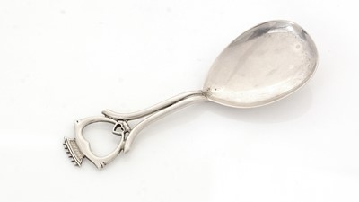 Lot 57 - A George V caddy spoon.