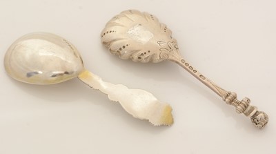Lot 60 - Two Victorian silver caddy spoons.