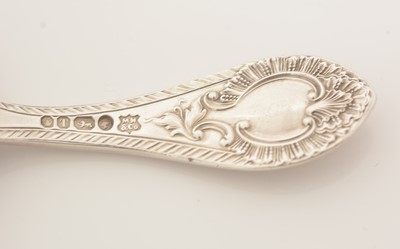 Lot 61 - A George V silver Scottish market caddy spoon; and a Victorian silver spoon.