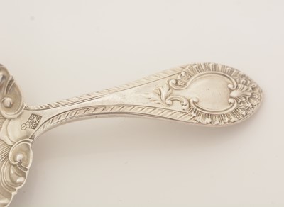Lot 61 - A George V silver Scottish market caddy spoon; and a Victorian silver spoon.