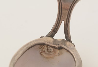 Lot 68 - A George III silver-mounted natural shell caddy spoon.