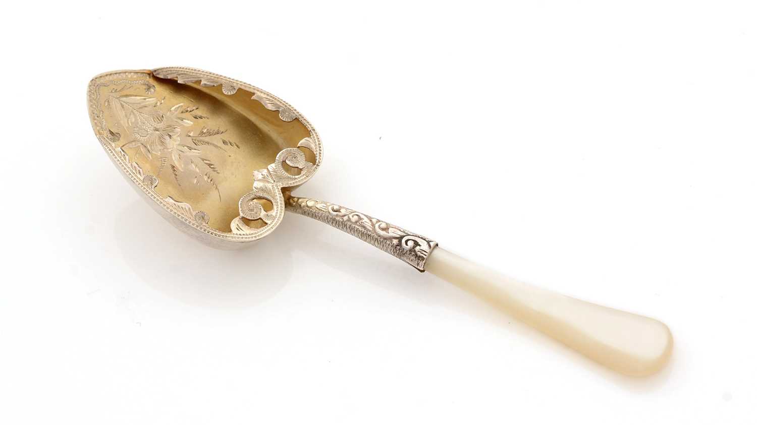 Lot 69 - A late Victorian parcel-gilt caddy spoon.