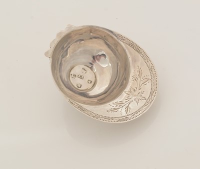 Lot 71 - A George III silver "jockey cap" caddy spoon.