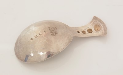 Lot 75 - A late Victorian silver Arts & Crafts caddy spoon.