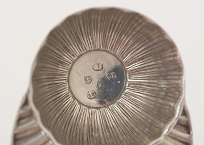 Lot 76 - A George III silver "jockey cap" caddy spoon.