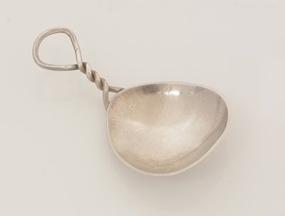 Lot 81 - A George V silver Arts & Crafts caddy spoon.