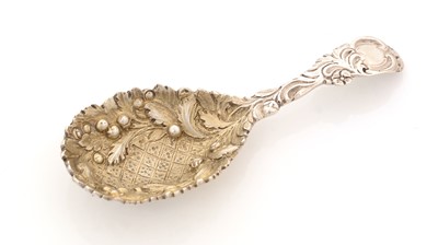 Lot 82 - A Victorian silver cast caddy spoon.