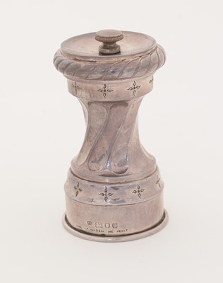 Lot 214 - A George VI silver-mounted pepper mill.