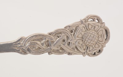 Lot 210 - A George V silver hand-made spoon.