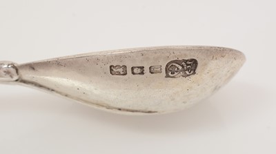 Lot 213 - A George V silver cast spoon.