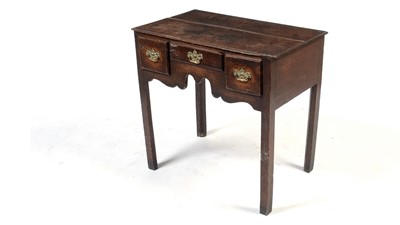 Lot 1134 - A mid-18th Century oak lowboy