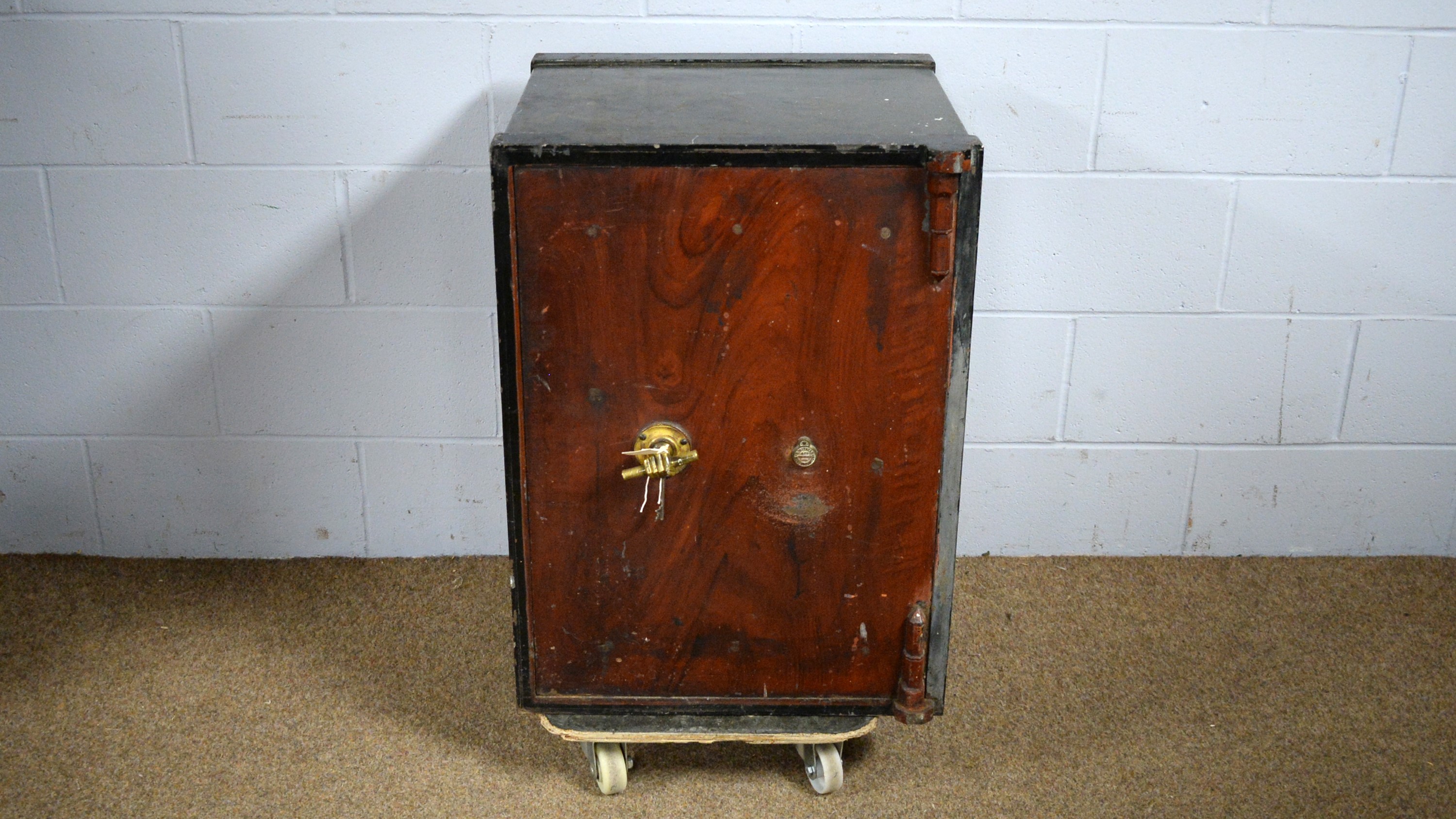 Lot 58 A vintage cast iron safe.