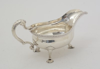 Lot 144 - A George III silver sauceboat.