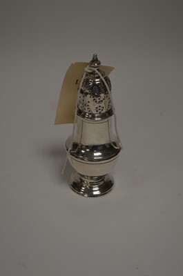 Lot 150 - A silver sugar caster, a pepperette and a trophy.
