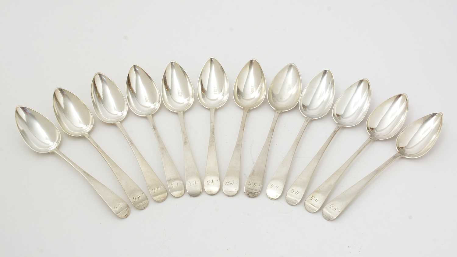 Lot 25 - A set of twelve George III Scottish Provincial silver tablespoons.