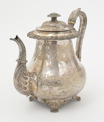 Lot 129 - A late period Old Sheffield plated coffee pot.