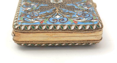 Lot 388 - An early 20th Century Russian silver-gilt and cloisonne enamelled cigarette case.