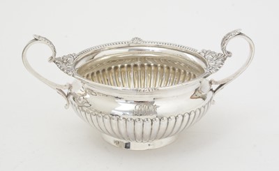 Lot 204 - A late Victorian silver four-piece tea and coffee service.
