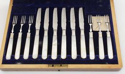 Lot 2 - A George V electroplated cased set of twelve pairs of fruit/dessert knives and forks.