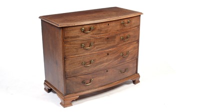 Lot 1108 - A George III mahogany bowfront chest.