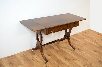 Lot 44 - A reproduction Regency-style inlaid mahogany sofa table