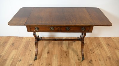 Lot 44 - A reproduction Regency-style inlaid mahogany sofa table