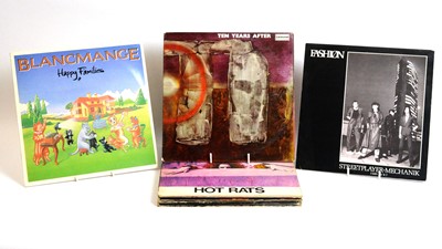 Lot 199 - 9 mixed rock LPs