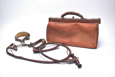 Lot 303 - A a leather greyhound coursing slip; and a Gladstone bag.