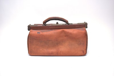 Lot 303 - A a leather greyhound coursing slip; and a Gladstone bag.