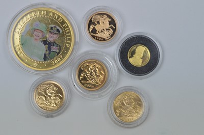 Lot 947 - Gold half sovereigns, and other coins