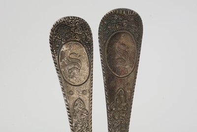 Lot 8 - Four George II silver tablespoons; and a silver sauce ladle.