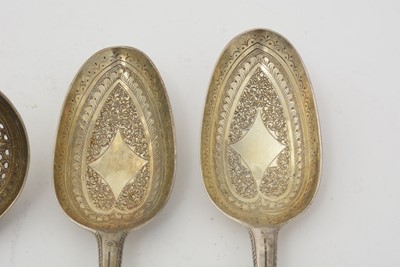 Lot 8 - Four George II silver tablespoons; and a silver sauce ladle.