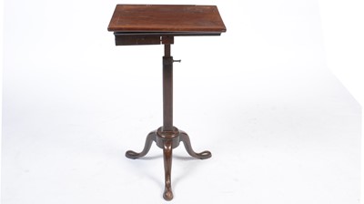 Lot 1097 - A George III mahogany reading table.