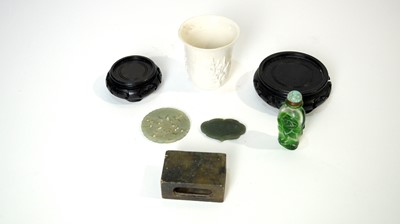 Lot 876 - Blanc de Chine cup, snuff bottle, two jadeite medallions, soapstone matchbox holder.