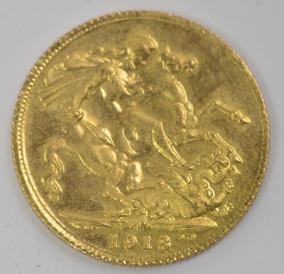 Lot 928 - A 22ct gold sovereign type coin