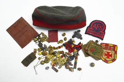 Lot 671 - German WWI cloth cap; cap badges, buttons and other items.