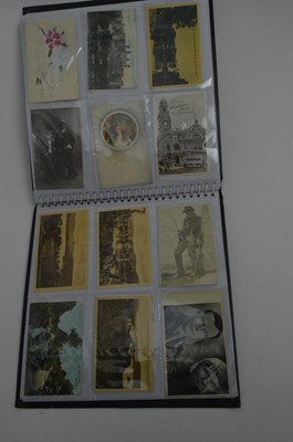 Lot 710 - Two albums of early 20th Century postcards