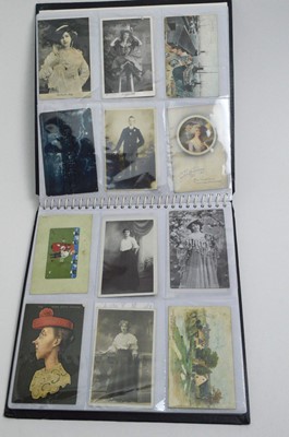 Lot 710 - Two albums of early 20th Century postcards