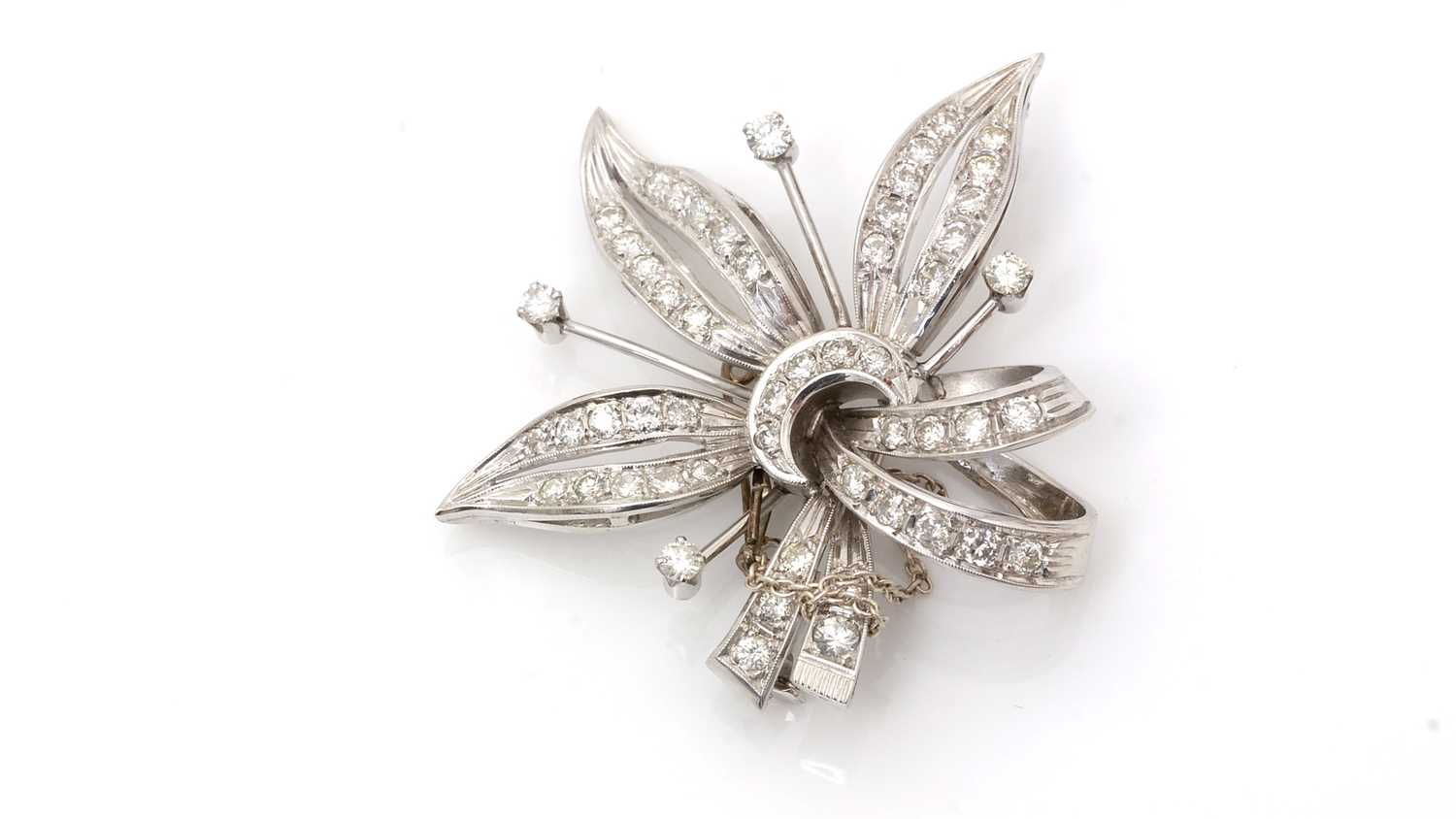 Lot 509 - A diamond floral spray brooch