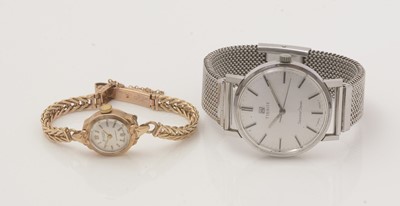 Lot 121 - A 9ct yellow gold Accurist wristwatch, and a Tissot Seastar Seven steel cased wristwatch