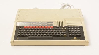 Lot 965 - A BBC Master Series Microcomputer; with slave utility units and Scrabble game software.