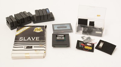 Lot 965 - A BBC Master Series Microcomputer; with slave utility units and Scrabble game software.
