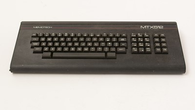 Lot 980 - A Memotech MTX512, with power unit, with manuals and gaming software.