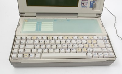 Lot 981 - An Olivetti M15 Plus laptop computer, with power unit.